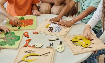 cropped-view-of-interracial-kids-playing-with-dida-X2UADDZ-1.jpg